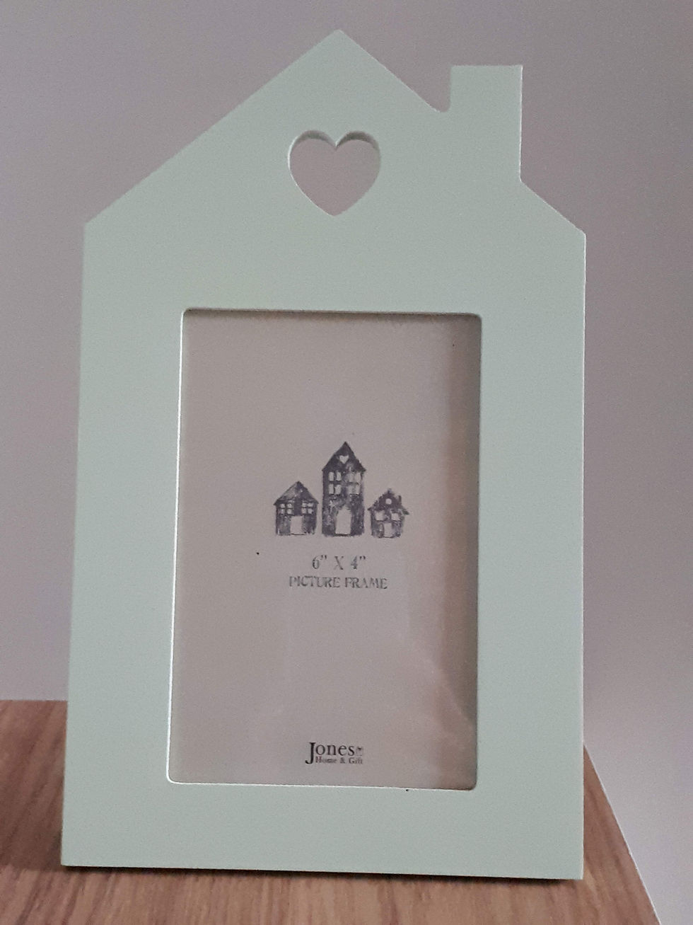 For those who love the coast, this photo frame in the shape of a beach hut is perfect for displaying those special memories.