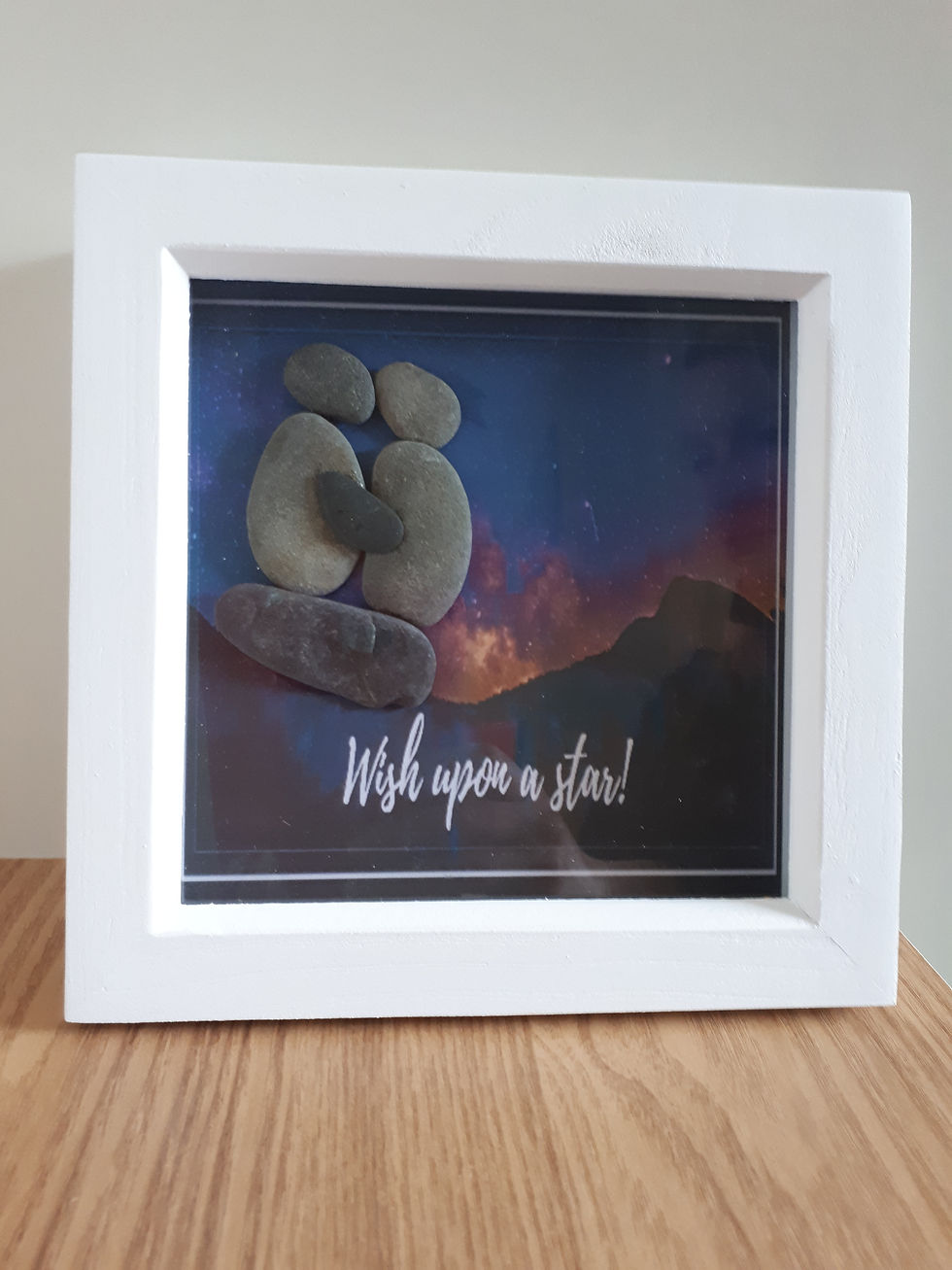 "Wish upon a star!".  This beautifully hand made pebble picture would make a perfect gift for a loved one.