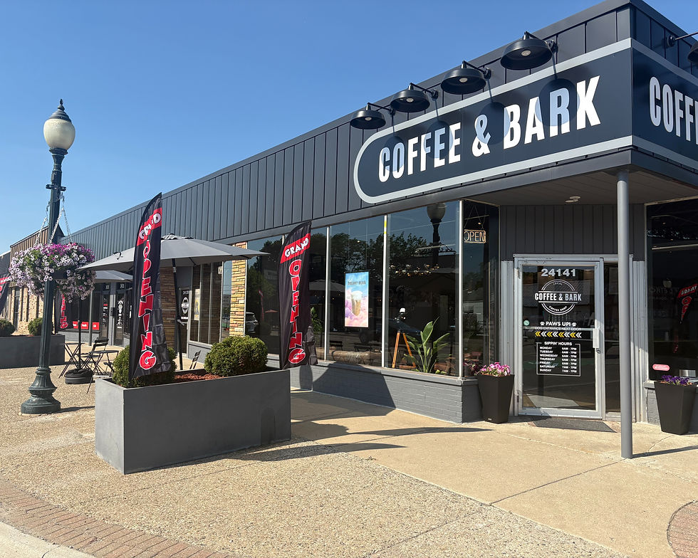 Front entrance of Coffee & Bark Hazel Park with outdoor seating and welcoming storefront.