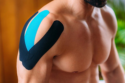 kinesiology-therapeutic-tape-patient-with-elastic-2024-10-21-15-56-48-utc.jpg