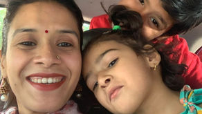 Cherishing joyful moments together as a family, sharing smiles and love in every cuddle.