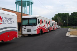 Bloodmobiles lined up outside school