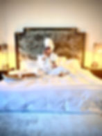 Amy West on Hotel Bed