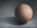 Still life study of a smooth sphere casting a shadow