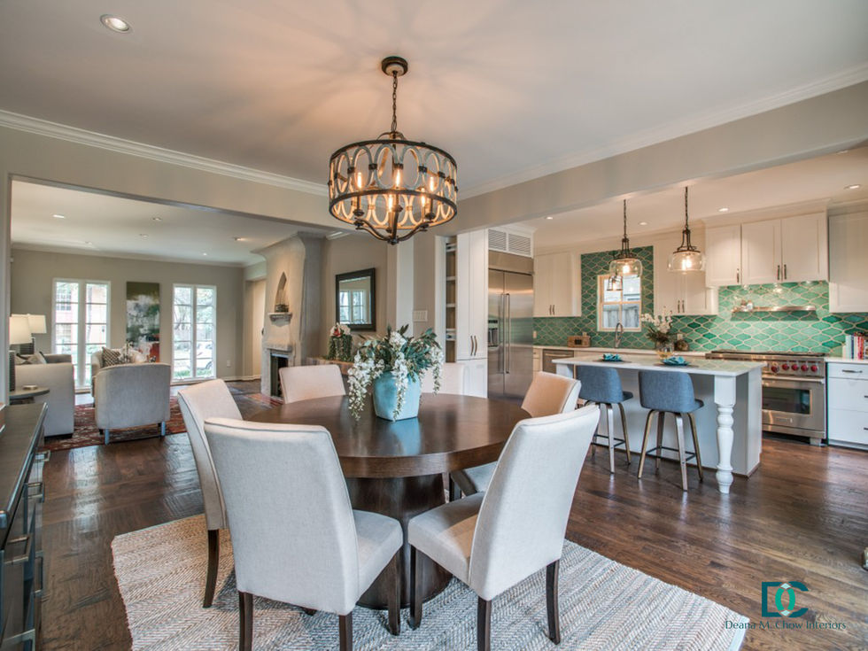 Elevated dining room design in McKinney, TX by Deana M. Chow Interiors, featuring layered decor, intentional flow, and a warm, welcoming aesthetic.
