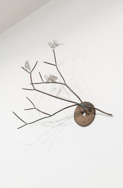 Sculpture of steel woven sparrows on steel branches and found objects. Artist Shona Rapira-Davies.