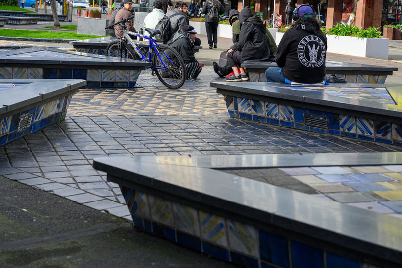 Photo of tiled triangular seating in Te Aro Park.