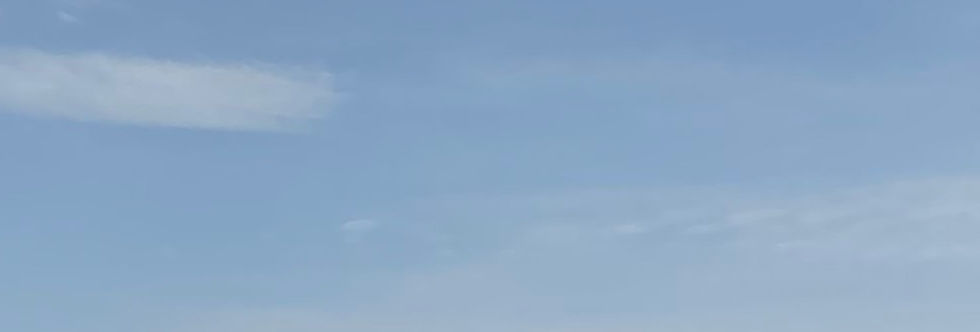 Blue skies and a seascape showing a calm mindset which is required when making decisions