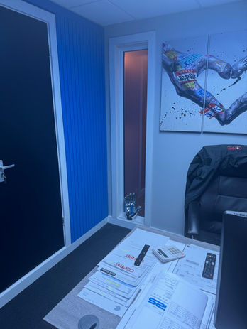 an office pod window installed into an office with no windows