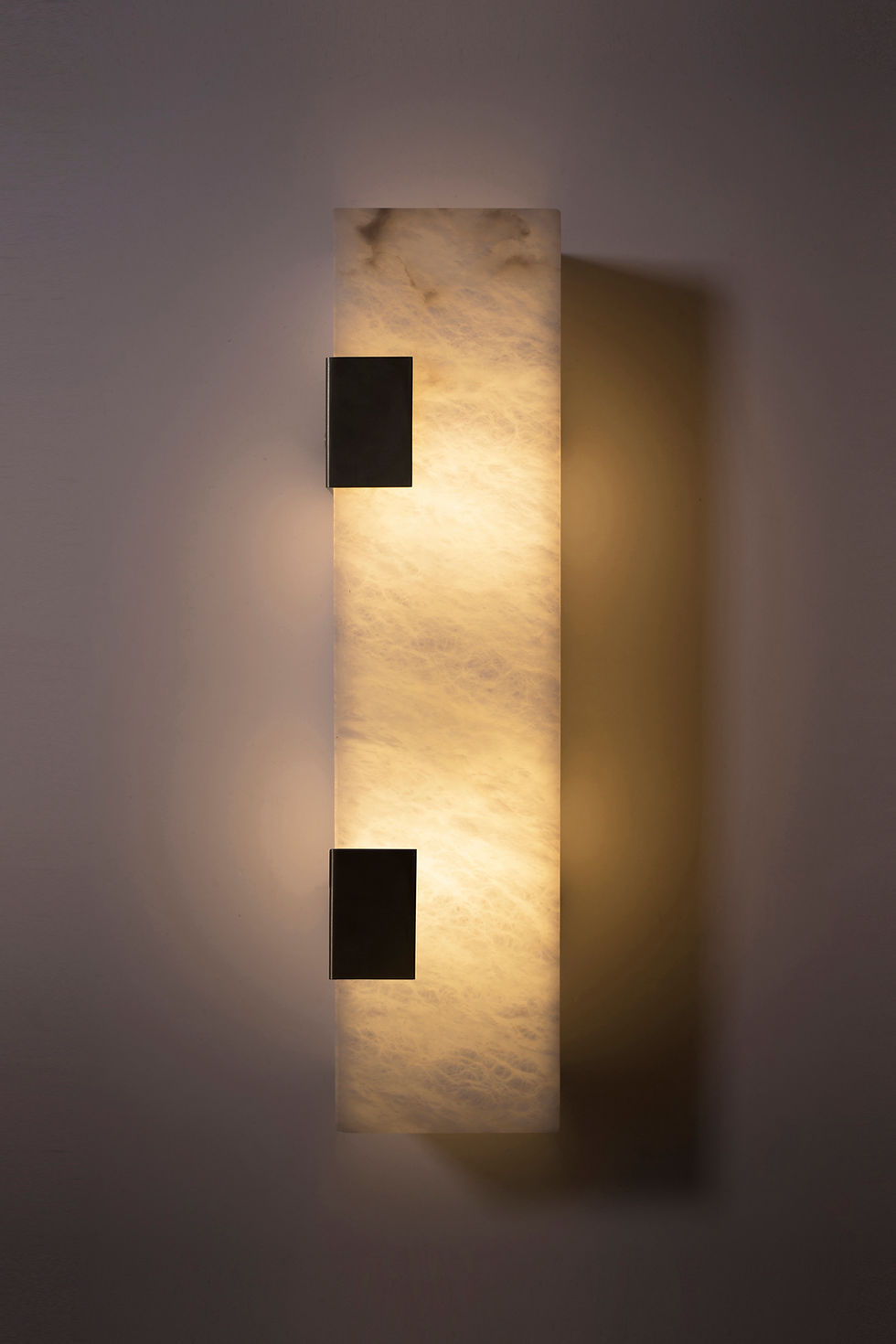 Thumbnail: Ponti alabaster sconce finished in blackened brass, 2 clip, front view, light on
