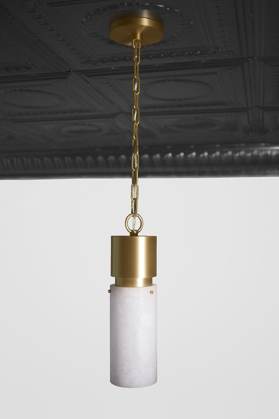 Thumbnail: Zona alabaster pendant finished in brushed brass, ceiling view