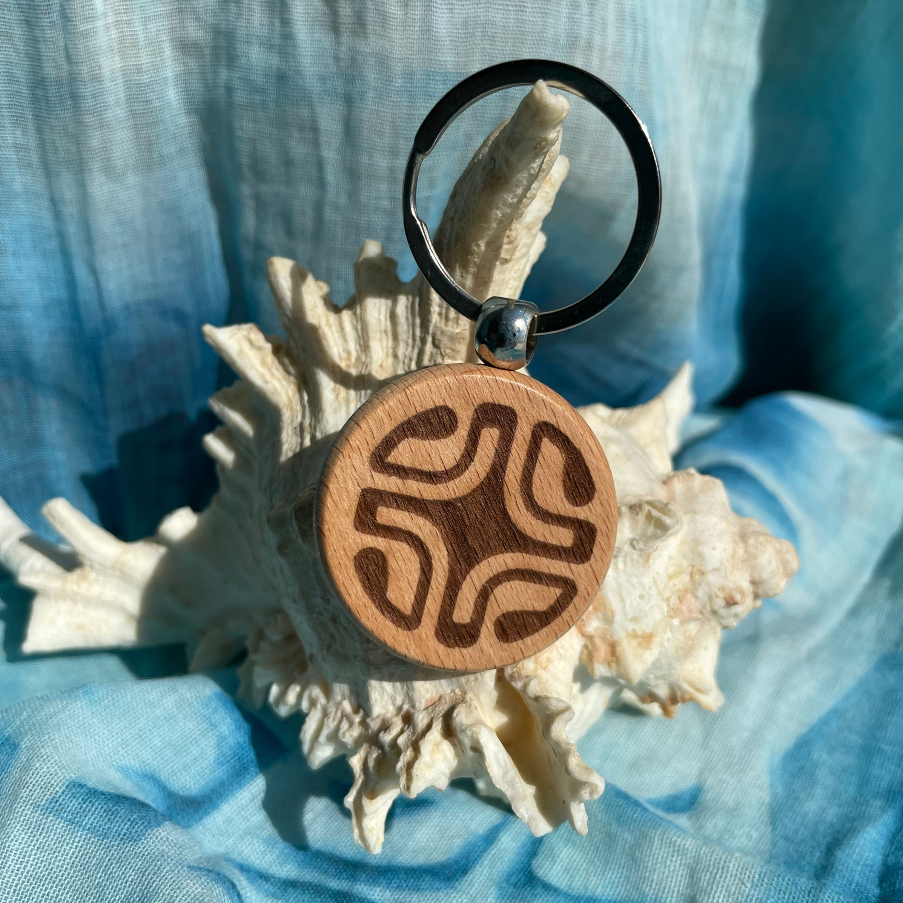 Porte clé « Croix marquisienne ronde »