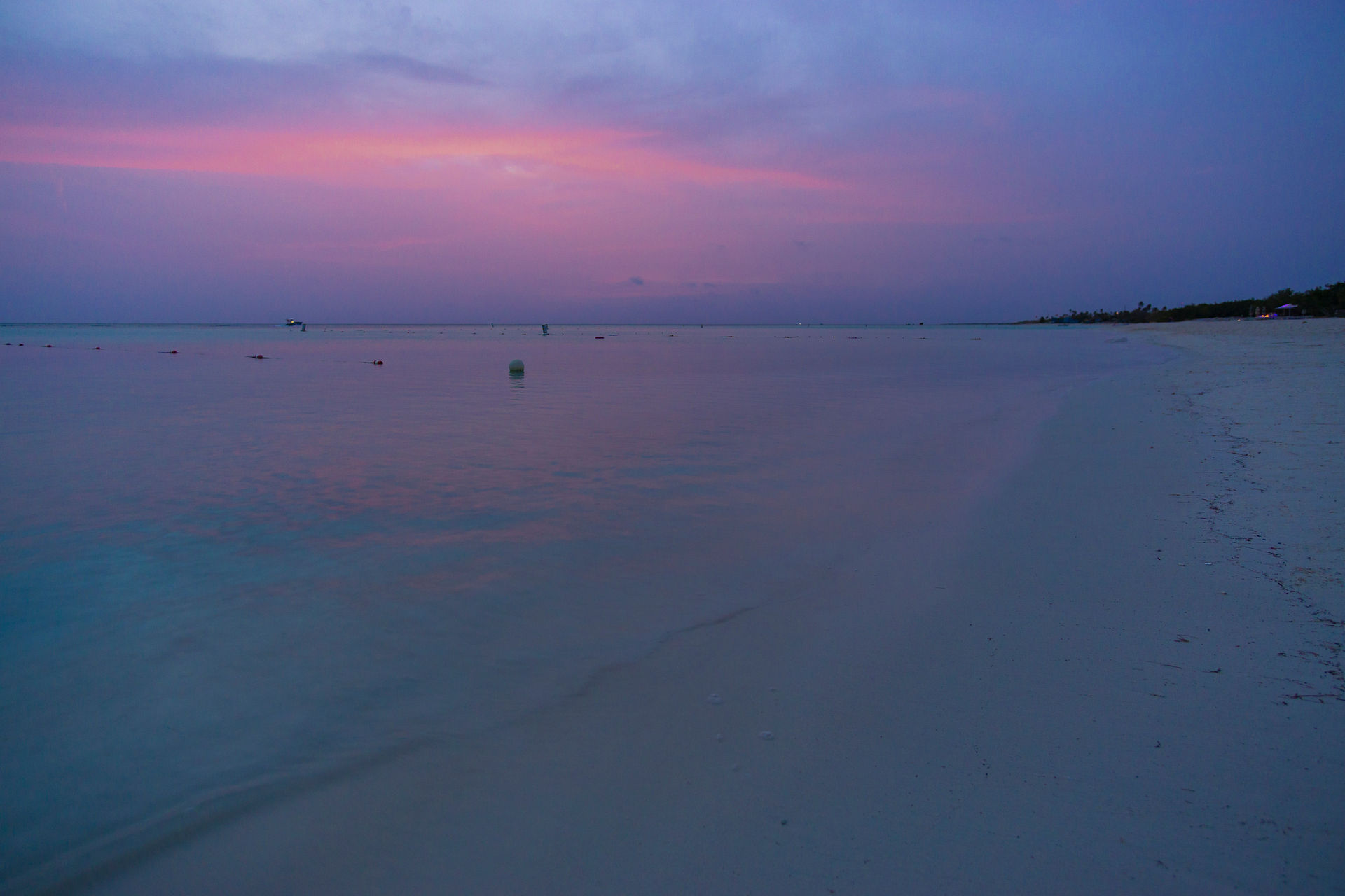 Another Aruba sunset with a beautiful pink sky.
