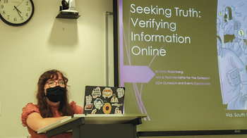 A photo of Emily Rosenberg giving a presentation on misinformation.