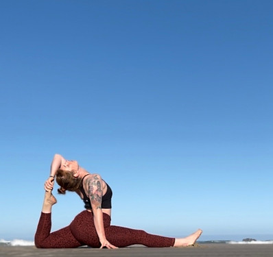 yoga teacher casey in universal yoga pose at lotus spirit counseling & yoga