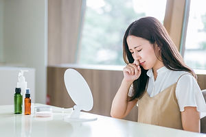 アレルギーに悩む女性