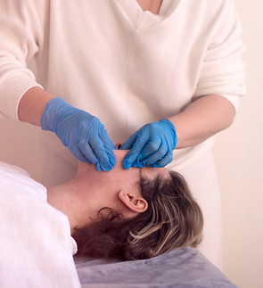 intraoral massage to a woman in a spa_ed
