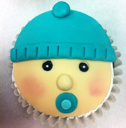 baby with binky cupcake