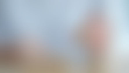 A hand picks a wooden block with a smiling face from a row of four blocks showing various emotions, set on a wooden table. Black Cohosh and St. John’s Wort for Mood Balance. Herbpy Blog.