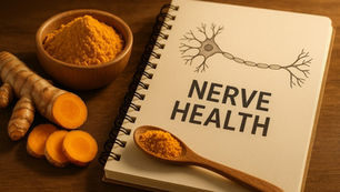 Notebook titled "Nerve Health" with neuron illustration, surrounded by turmeric powder, slices, and root on wooden surface. Warm tones. Herbpy Blog.