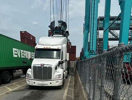 Norfolk Port Shipping Trucking Company Hauling Hotshot.webp