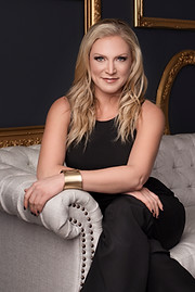 JP 2022 seated couch headshot.jpg