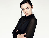 Serious Woman Black Sweater
