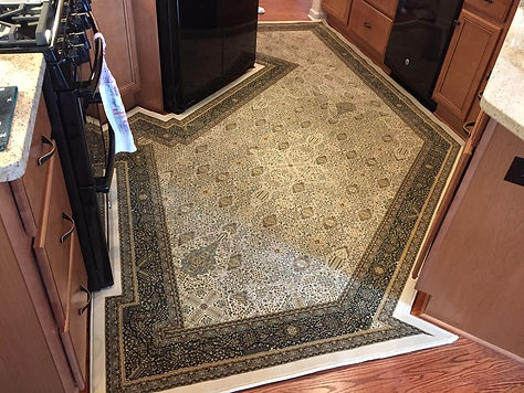 custom shaped rug contoured around room in kitchen