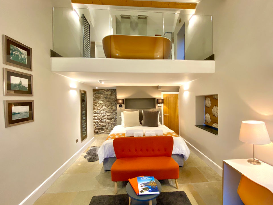 Stone Suite at 1692 Wasdale with its luxury bed and bathroom.