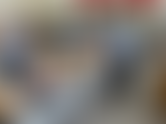 Cuban customs officials inspecting packages sent by the Tuanigo shipping agency on a conveyor belt inside the customs inspection area.