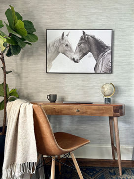 Nashville vacation rental home office design with wood desk, leather chair, and horse artwork