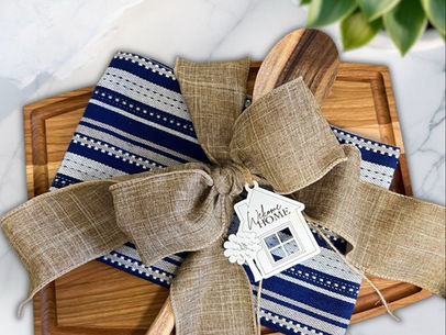 Real estate closing gift with cutting board and house tag