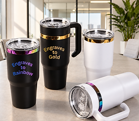 Engraved tumblers in black and white on a table