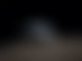 View of the Earth setting behind the Moon, taken by the Artemis II crew.