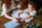 Woman and boy painting