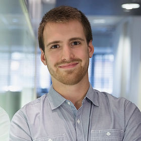 Young Man Smiling in the Office