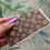 Thumbnail: blisovi fe 1.5/30 Bedazzled birth control case with Louis Vuitton design and rhinestones.