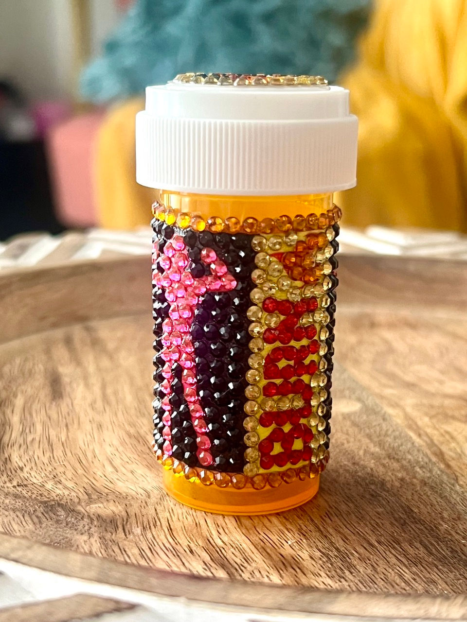 BURN Bedazzled Pill Bottle with pink strong woman design, featuring pink and purple lips adorned with rhinestones. fat burnin