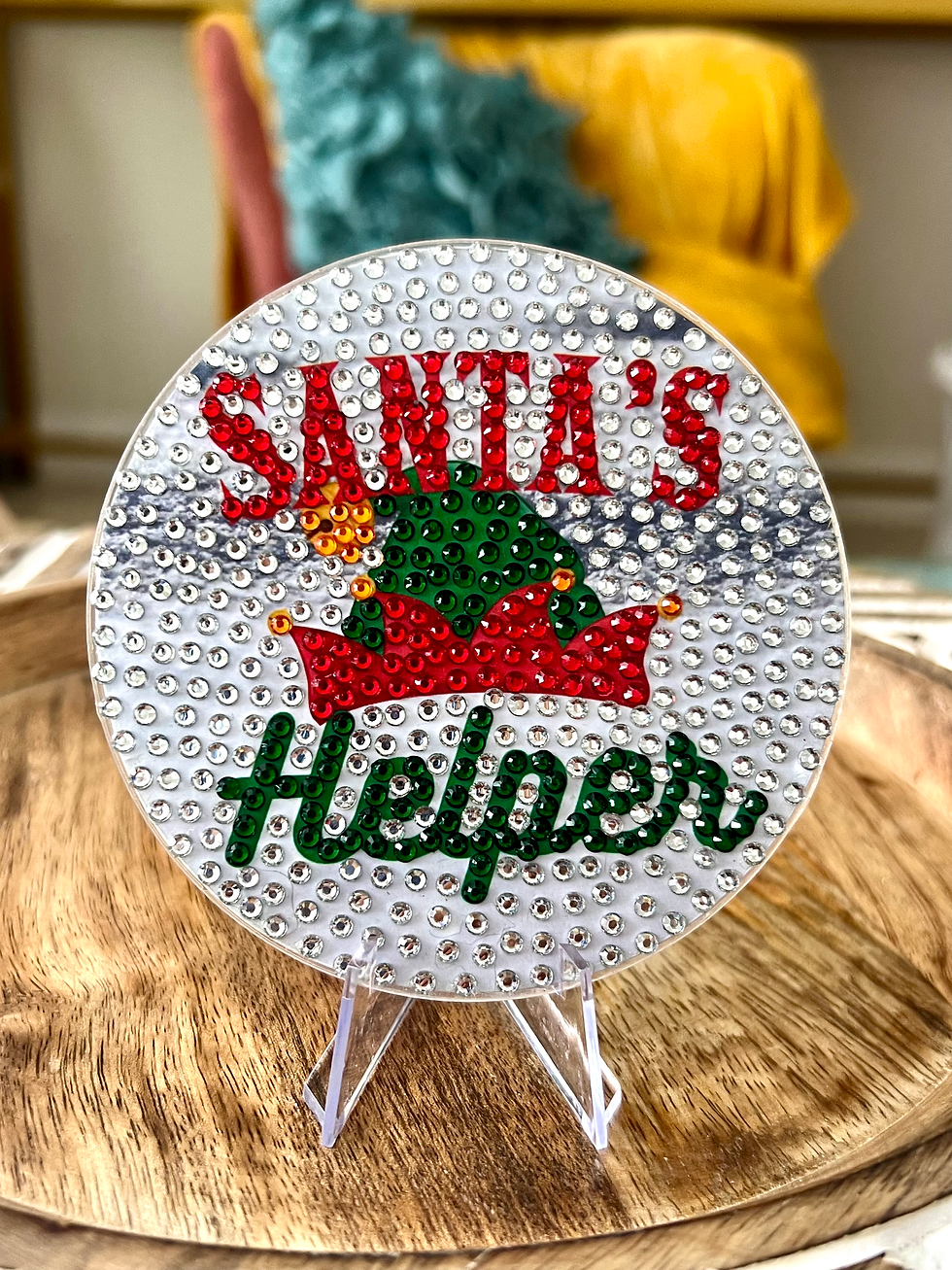 Bedazzled coaster with an elf hat for holiday beverages. blinged christmas. best christmas decor. bedazzled festive.