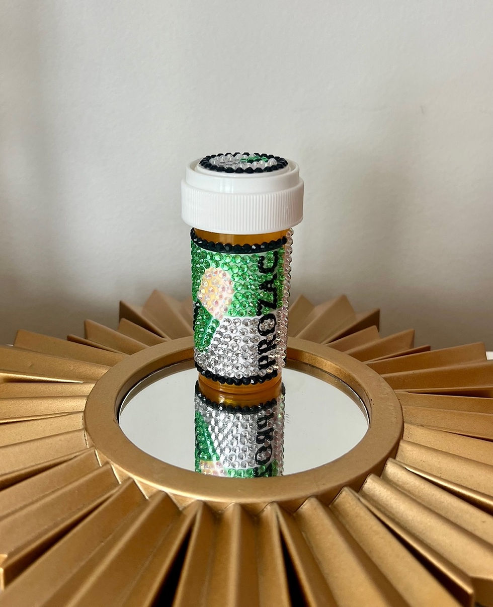 Thumbnail: Bedazzled pill bottle with a red lips design and Prozac logo. jonathan adler inspired