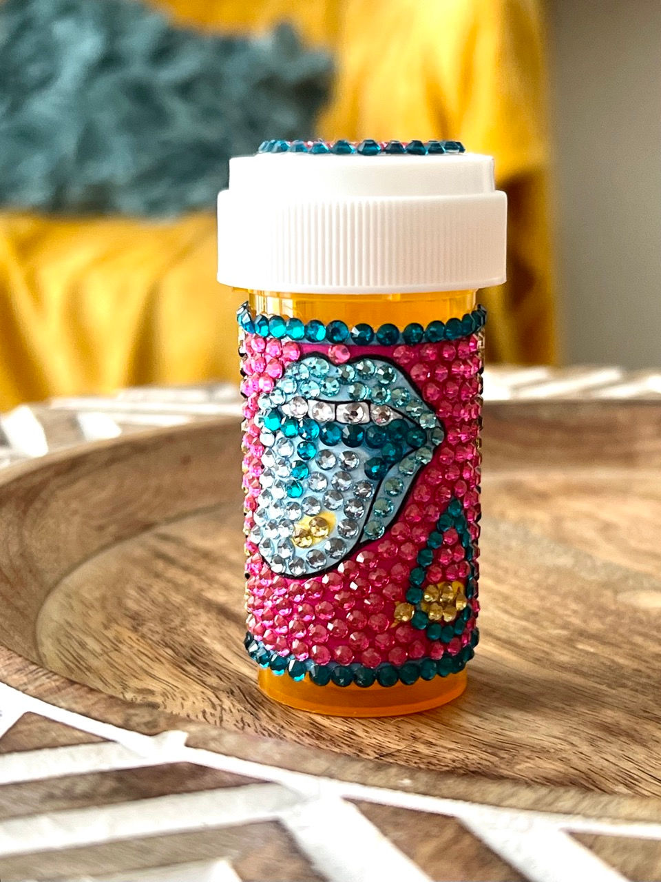 Thumbnail: Fish Oil Bedazzled Pill Bottle with blue lips and mouth design, featuring blue zircon, light hot pink, aquamarine, crystal ye