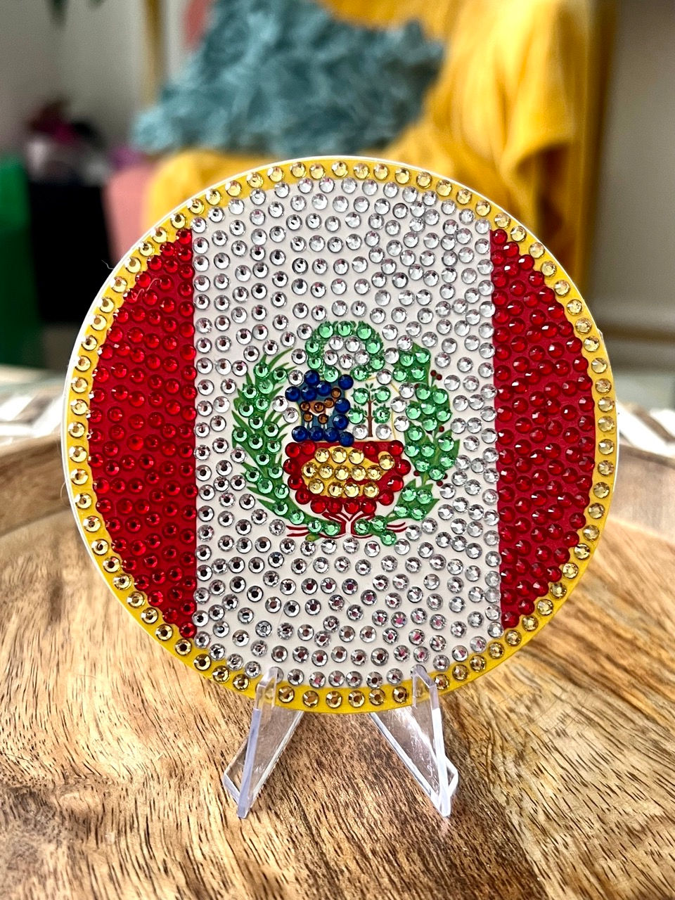 Bedazzled coaster featuring the Peru flag., ideal for Peruvian football fans and holiday celebrations.