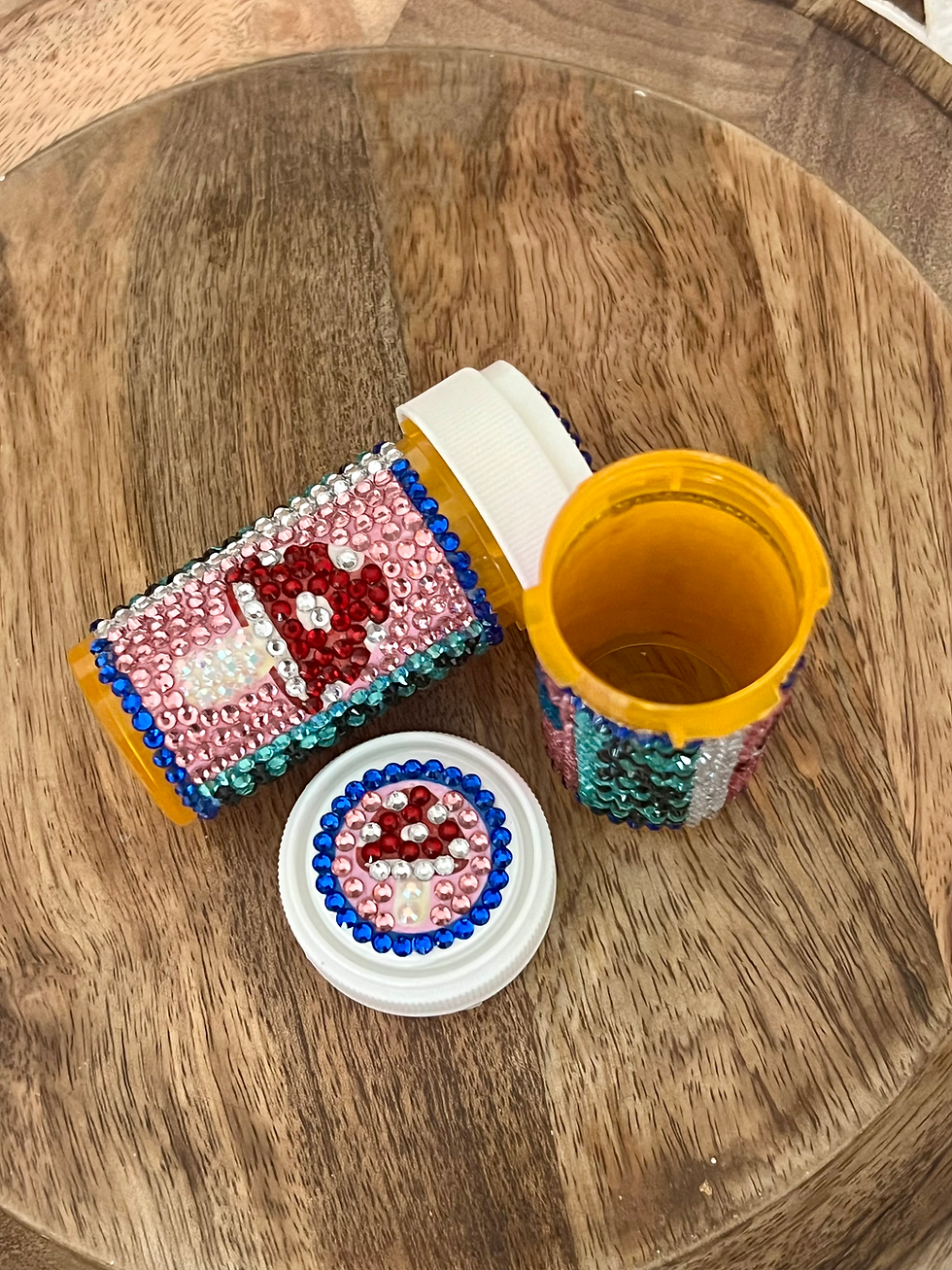 Thumbnail: Bedazzled pill bottle with a vibrant mushroom and colorful pills design, handcrafted for a joyful touch to any space.