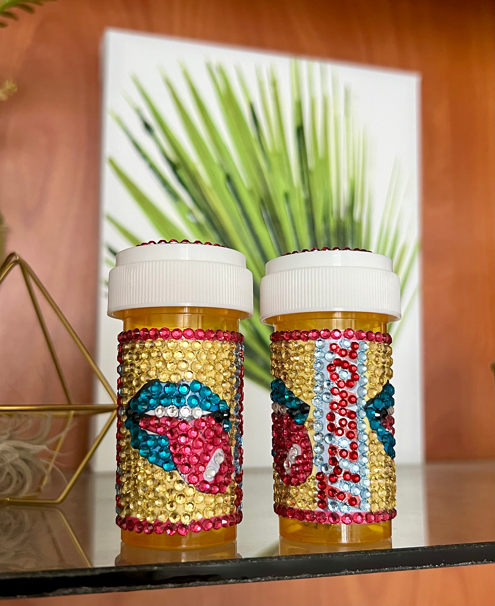 Thumbnail: Jonathan Adler-inspired pill bottle bedazzled with rhinestones, perfect for storing pain and headache pills