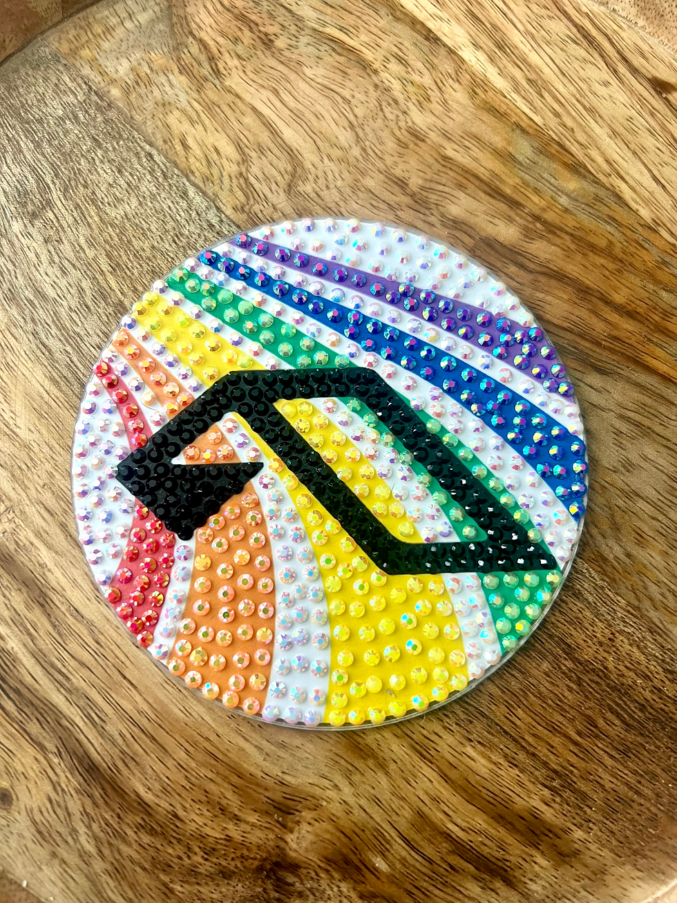 Thumbnail: Bedazzled coaster with the Anjunabeats logo in rainbow colors, perfect for trance music enthusiasts and anjunafamily.