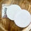 Thumbnail: DIY rhinestoned diamond painting coaster kit with custom designs, rhinestones, and adhesive cork backing.