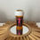 Thumbnail: BURN Bedazzled Pill Bottle with pink strong woman design, featuring pink and purple lips adorned with rhinestones. fat burnin