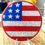 Thumbnail: Handcrafted USA Flag Bedazzled Coaster with sparkling gems and rhinestones, perfect for patriotic celebrations. 2024 flag dec