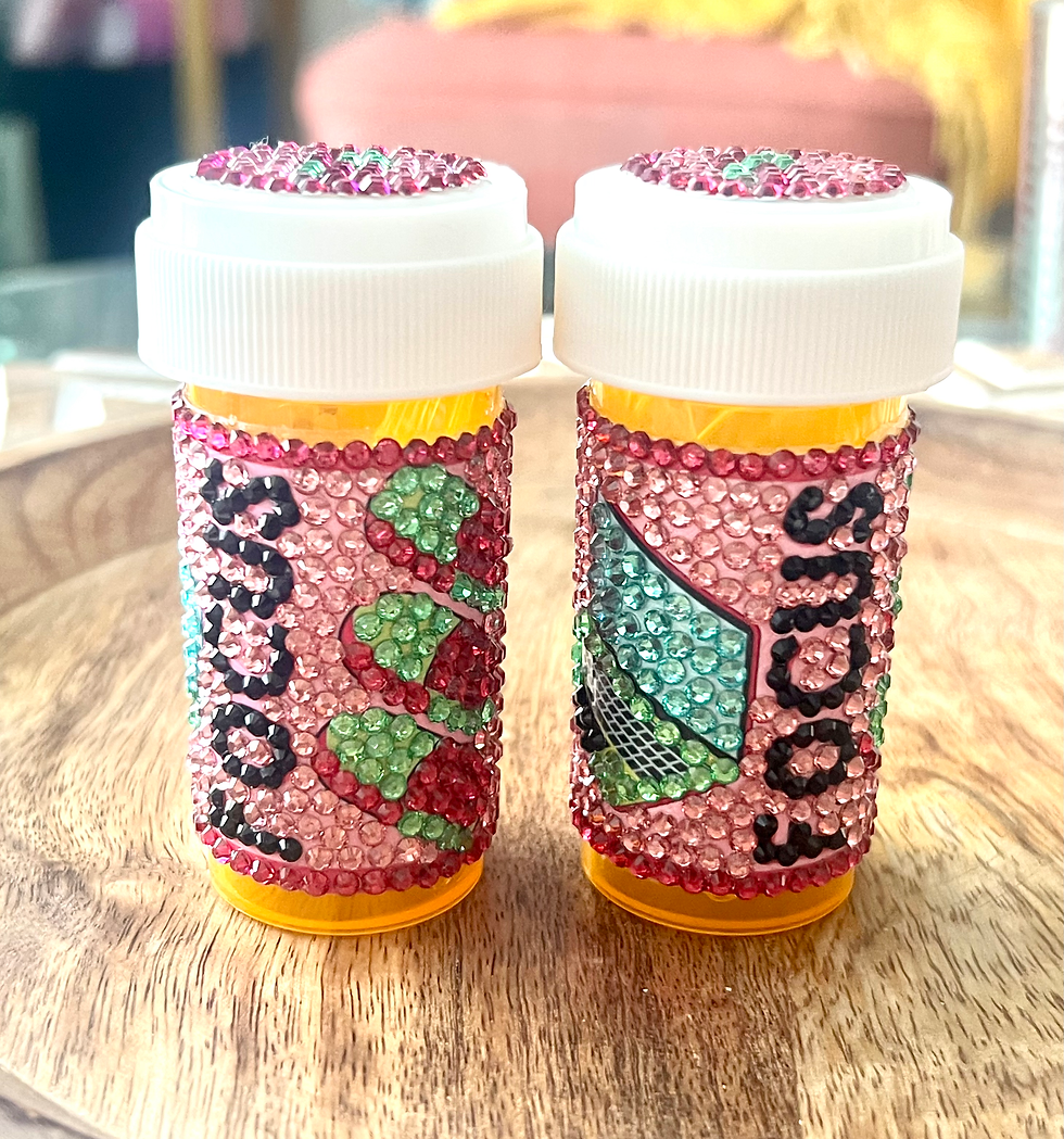 Thumbnail: vibrant blue and green bedazzled and blinged pill bottle with hot pink and lime green capsule design, neon colors