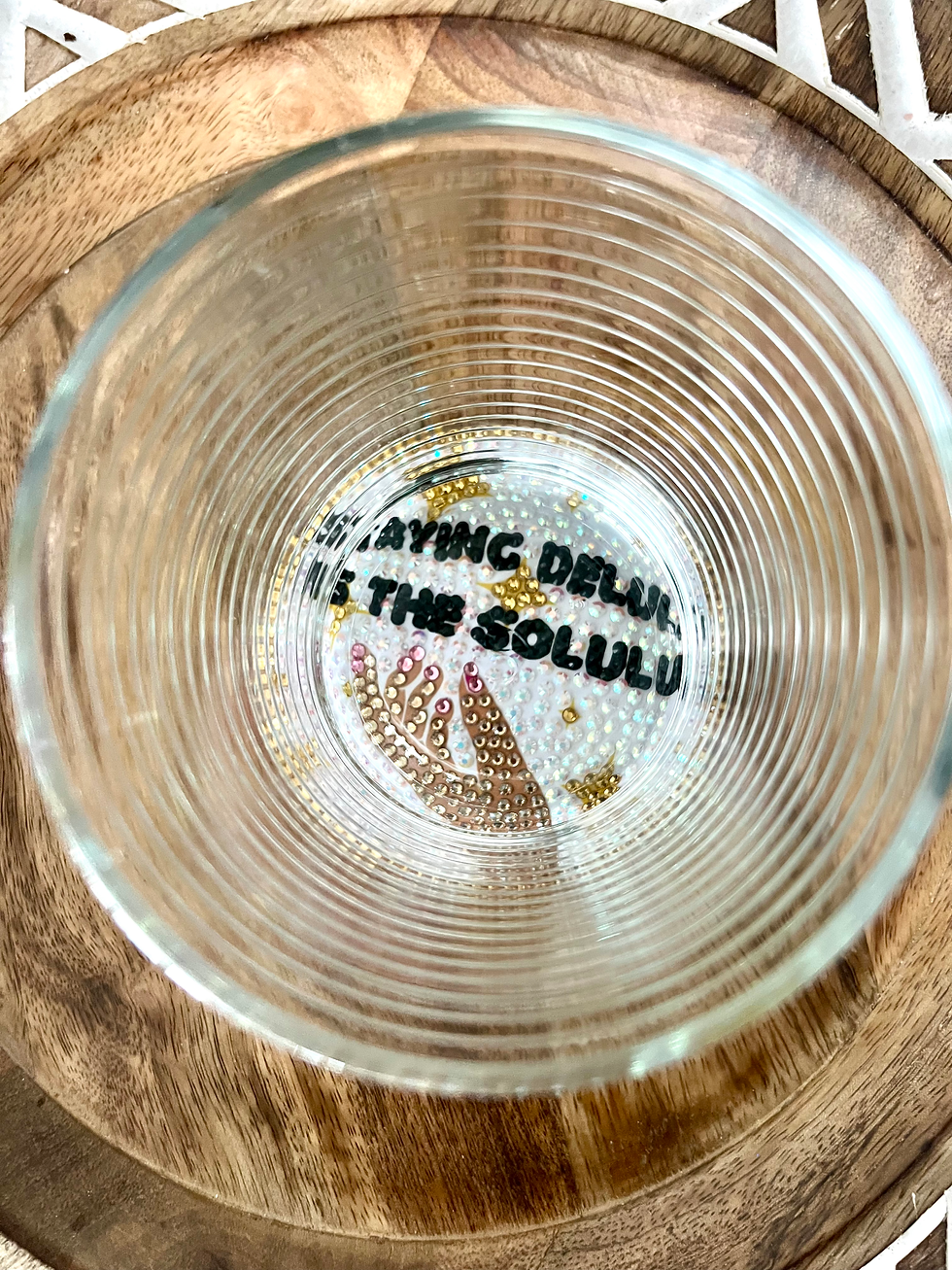 Thumbnail: Bedazzled coaster with a funny and quirky design promoting mental health awareness. delulu is the solulu. tiktok best gifts